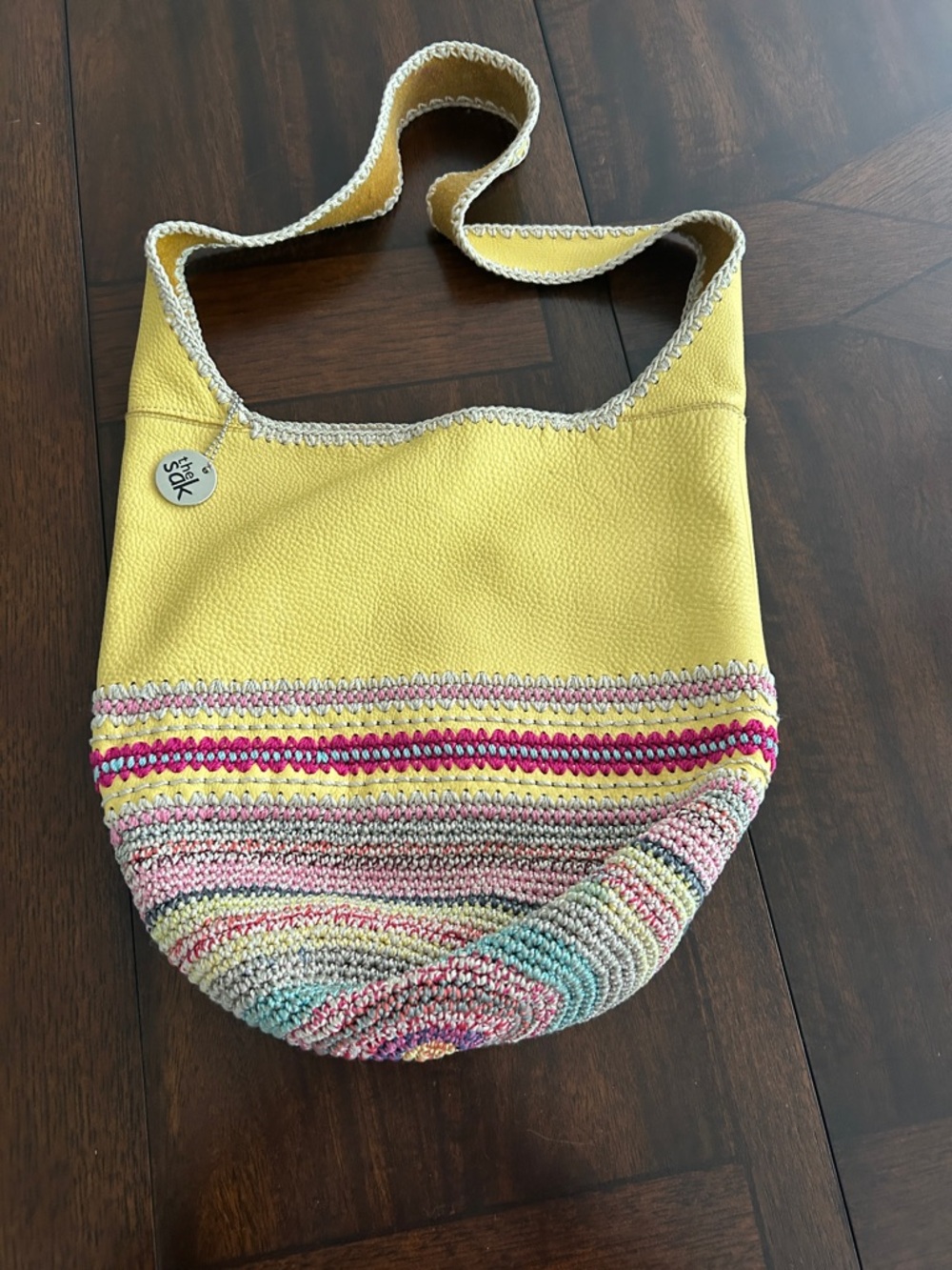 the Sak Yellow Shoulder Bag with Multicolor Crochet Base